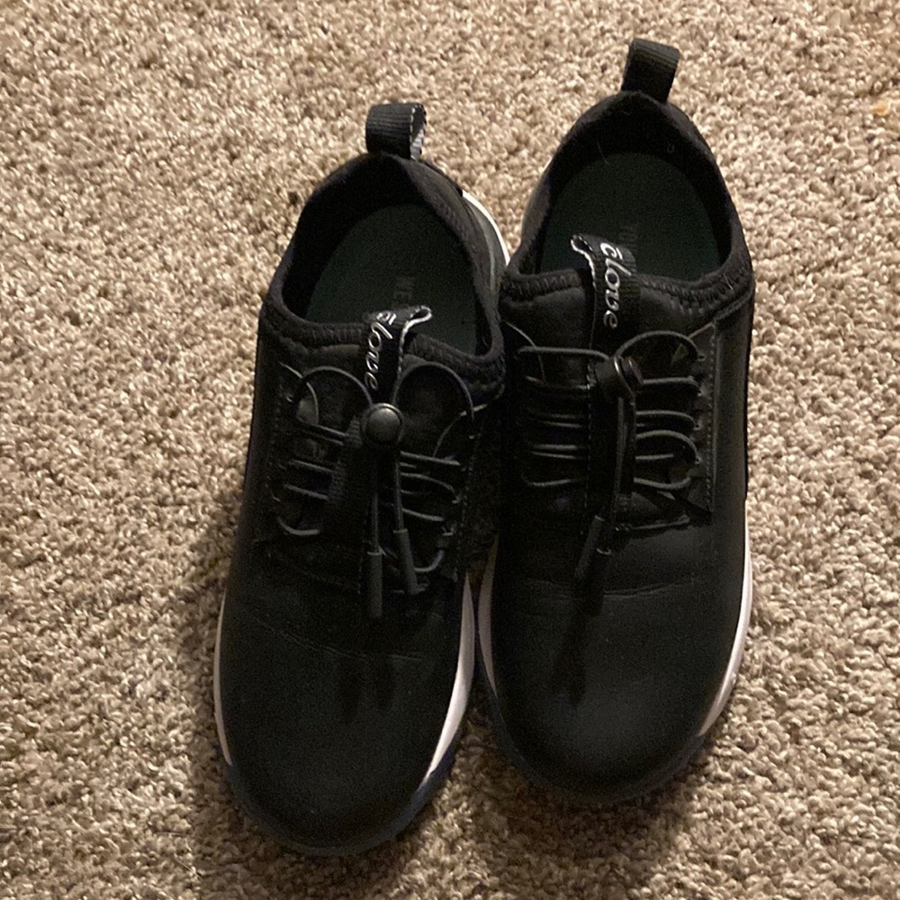 Clove nursing shoes black with white and blue bottoms